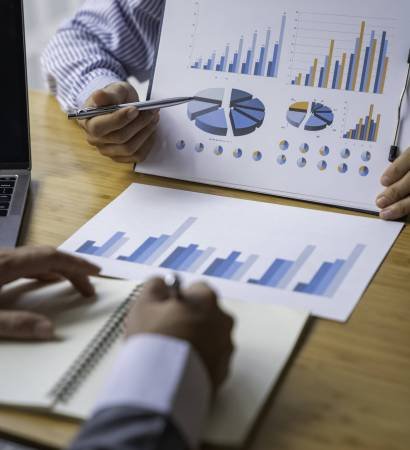 asesoría_empresarial_cordoba Business advisor analyzing financial figures denoting the progress Internal Revenue Service checking document. Audit concept