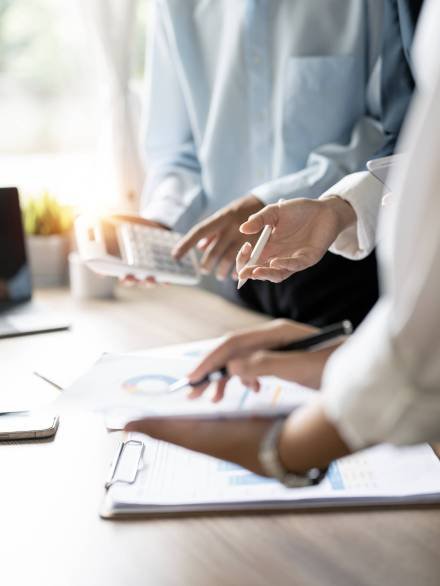 Businesswoman advisor, business people talking, planning analyze Businesswoman advisor, business people talking, planning analyze investment and marketing on tablet in office.